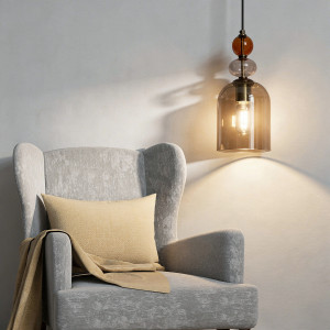 Bursztynowa lampa wisząca Tropea nad stołem w jadalni